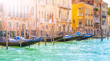 Fototapeta na wymiar Gondolas along Grand Canal in Venice