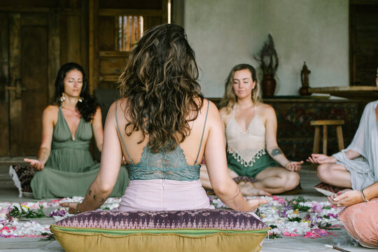 Group of Women Meditating Together