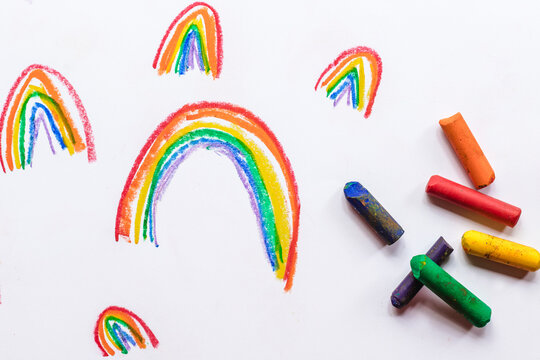 Colourful Rainbows Drawn on Paper 