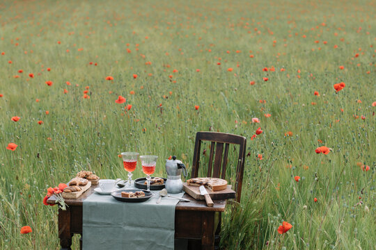 Still Life Of Italian Rustic Breakfast In A Poppy Field