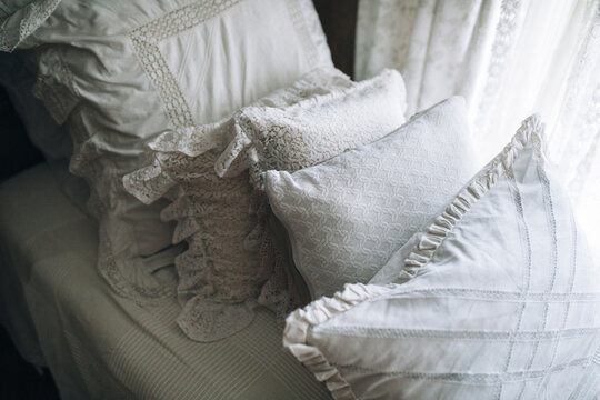 White pillow on pile