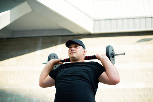 White man doing sports on the street