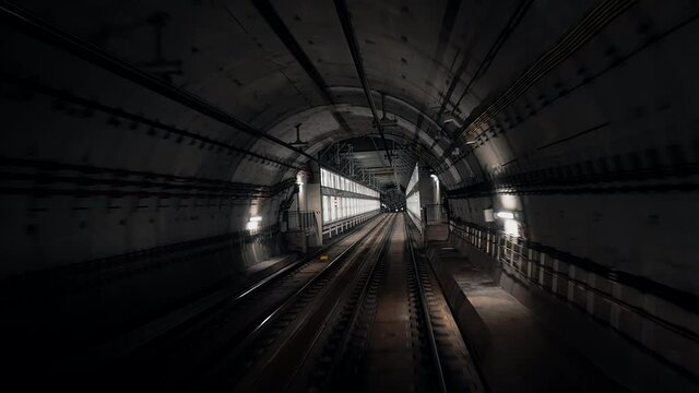 Moving underground carriage arriving to automatic metro station. Riding subway train in Barcelona city to airport L9 Sud. Footage of modern public mode of transport