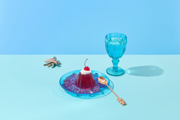 Jelly cake and goblet with drink