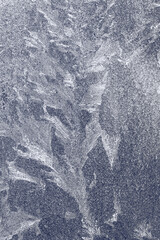 monochrome background with ice on glass