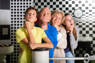 Family of four ponders solution to the puzzle in the quest room