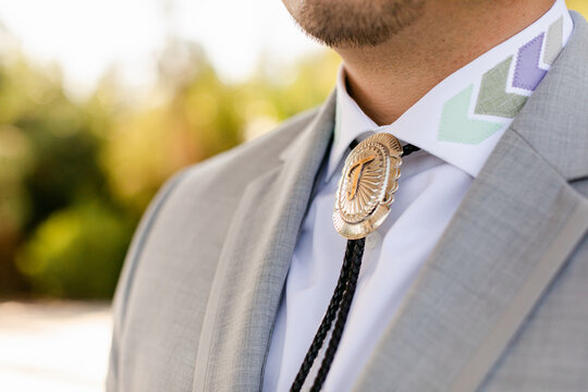 Closeup of Bolo Tie on Groom's Suit