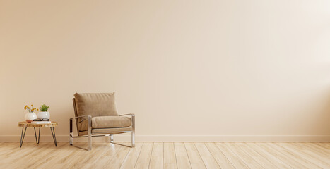 Modern minimalist interior with an armchair on empty cream color wall background.