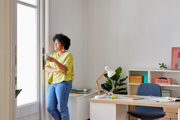 Pensive businesswoman in office
