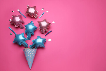 Beautiful balloons and party hat on pink background © Pixel-Shot