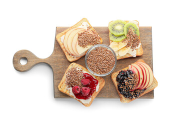 Tasty sandwiches with fruits and flax seeds on white background