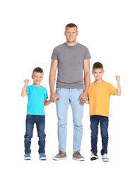 Obraz premium Portrait of father with little children isolated on white