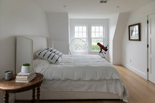 Bedroom in Contemporary home with telescope