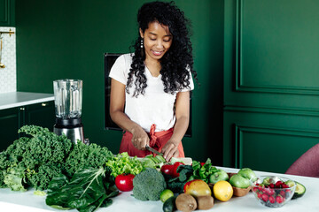 Black woman cooking healthy food