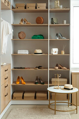 Obraz na płótnie Canvas Modern wardrobe with stylish accessories and shoes