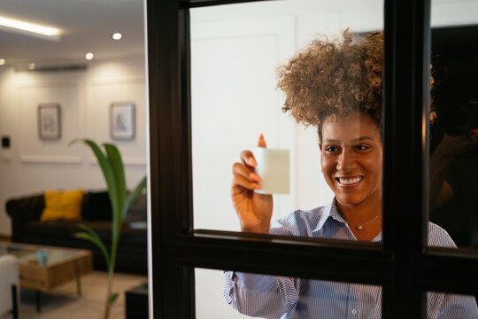 Black woman with sticky note