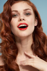attractive red-haired woman red lips face close up