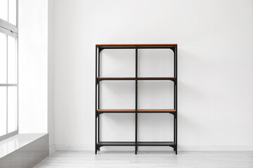 Big black shelving unit near light wall