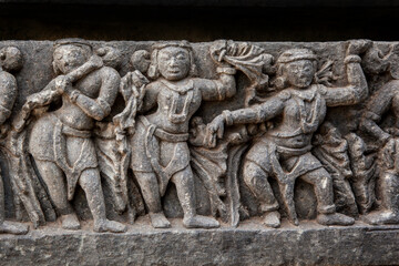 The sculptures of musicians and dancers on the exterior walls of Hoysaleshwara temple at Habebid,...