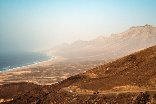 Deserted coast washed by ocean