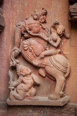 Fototapeta na wymiar A sculpture of worrier on the exterior of Mukteshwar temple at Bhubaneshwar, Odisha, India.