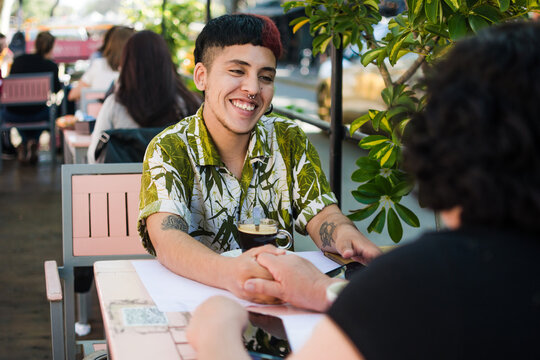 Gen Z transgender man sharing beautiful moment with mom