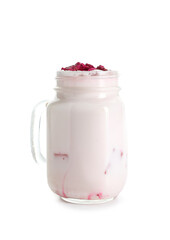 Mason jar of tasty rose latte on white background