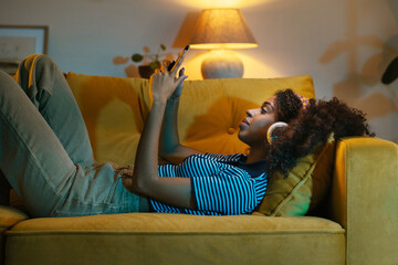 Black woman texting on cellphone