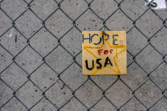 Hope for USA tile on fence