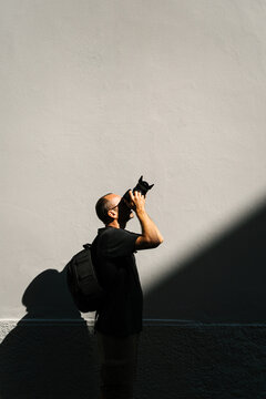 Man taking photo with camera