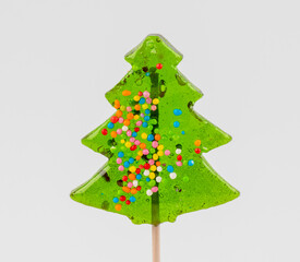 Christmas candy canes in the form of a tree on a white background.