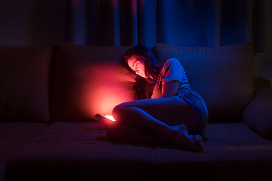 Bored woman browsing social media