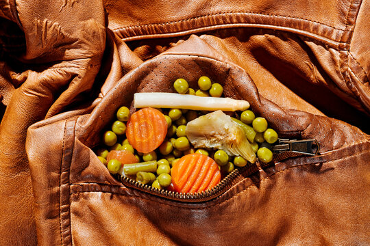 steamed vegetables in the pocket of a jacket