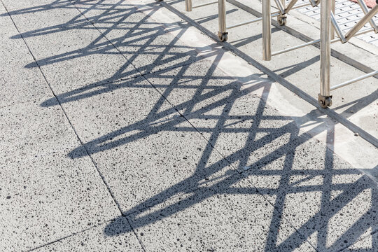 Closed iron gate shadow.