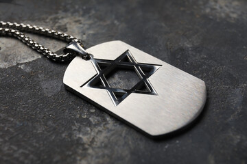 Military tag of Israeli soldier on grey background