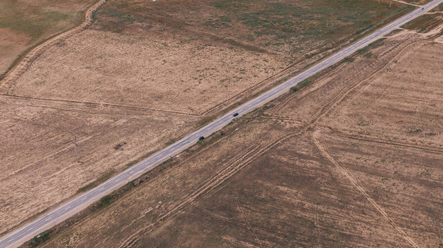 Aerial view of a sraight road in steppe of Kalmykia
