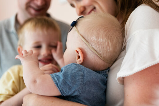 Family: Parents, Son And Daughter In A Fun Mood