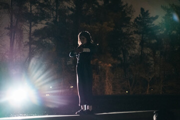 Young dancer performs on a ledge