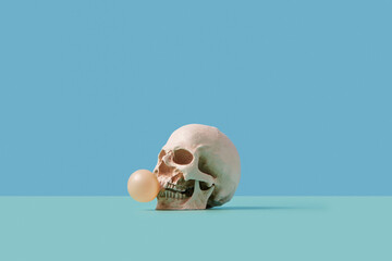 Skull blowing bubble gum