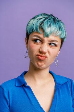 Flirty young woman pouting lips