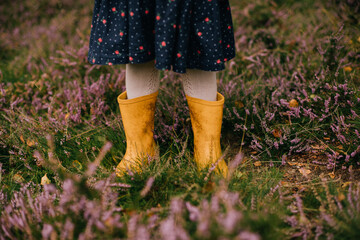 A Little Girl in a Pair of Yellow Welly Boots