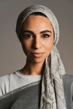 Muslim female looking smiling at camera