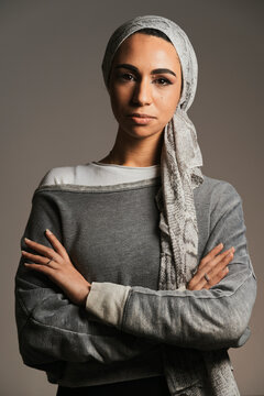 Muslim female looking smiling at camera
