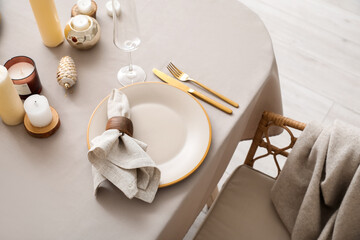 Dining table with setting for Christmas celebration indoors