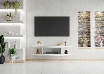 TV on a white concrete wall decorated with vases, wine bottles and plant pots.3d rendering.