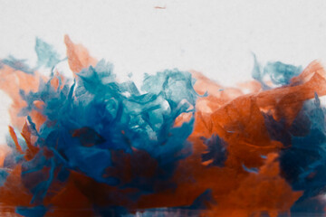 Orange and Blue Paper floating in water