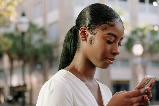 Female Professional Using Cell Phone.