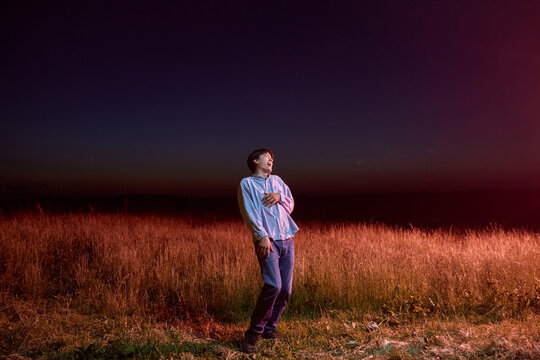 Man Laughing In The Field