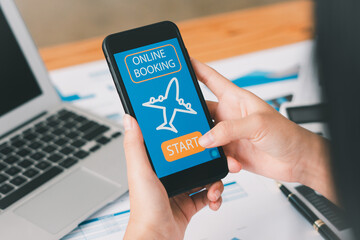 Woman Booking Flight Online with smartphone.