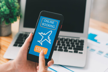 Woman Booking Flight Online with smartphone.